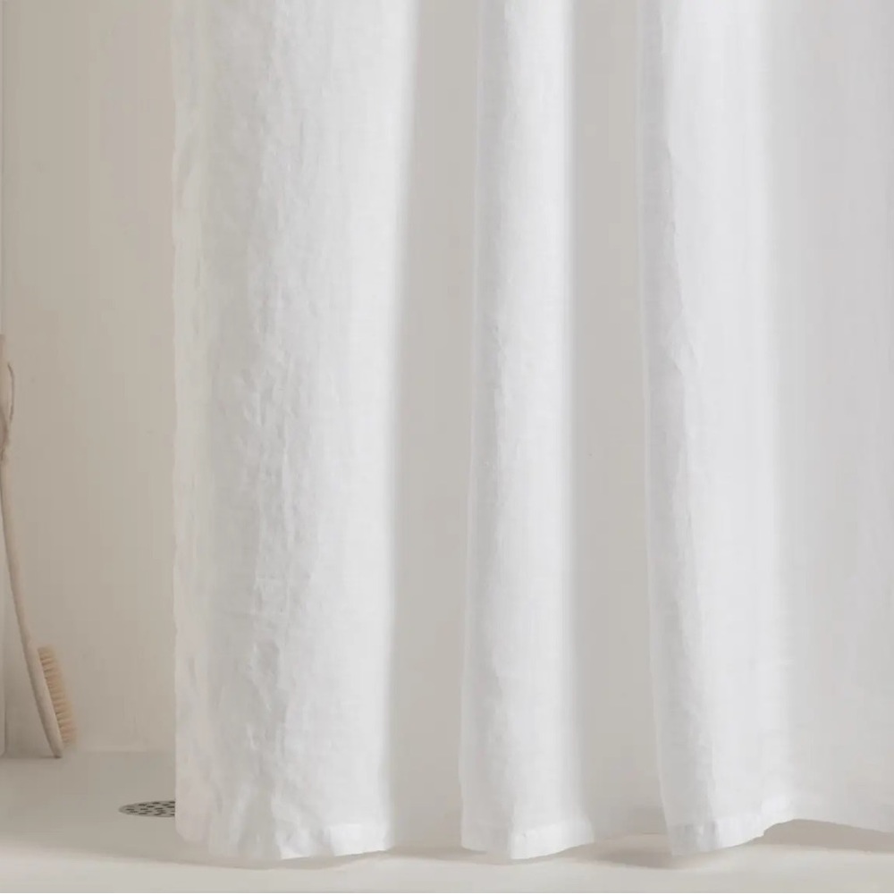 Parachute linen shower curtain in white + brass shower hooks
